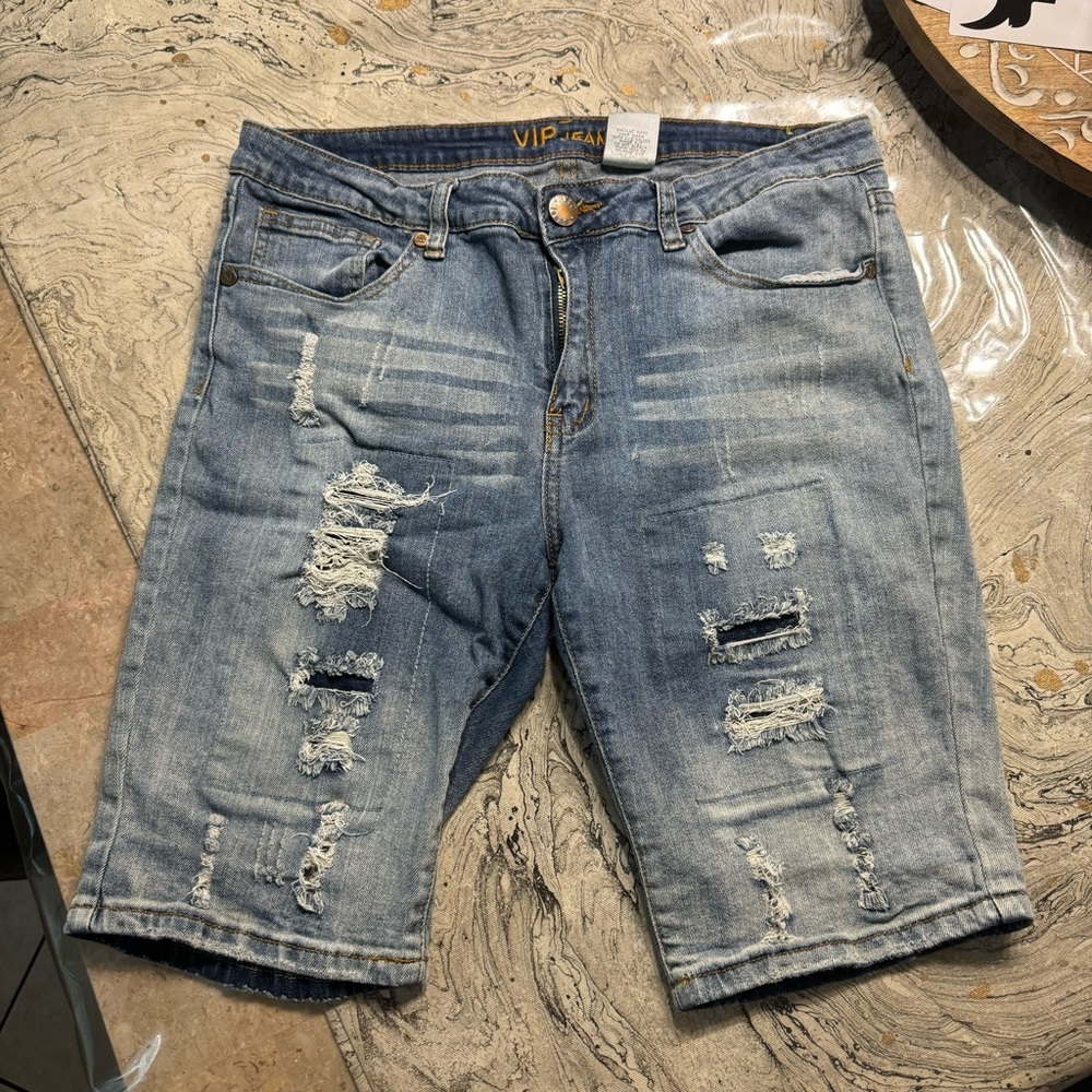 Women’s denim Jean distressed ripped shorts 
Size 13/14
Brand is Vip 
In great